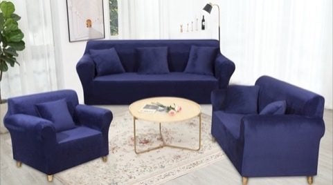 Living room set dressed in navy blue velvet full-wrap sofa covers